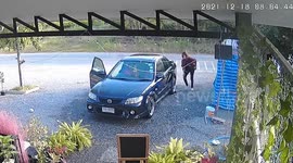 Bungling driver chases after car when it rolled over as she left without pulling the handbrake