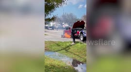 Bizarre moment a Tesla randomly catches fire after water damage during Hurricane Ian