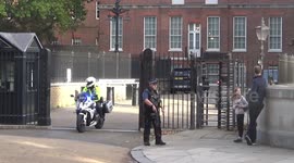 Embattled Liz Truss leaves Downing Street after not attending PMQs