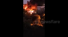 Russian warplane crashes into apartments near Ukraine; at least six dead