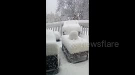 Early season winter storm dumps heavy snow on Michigan