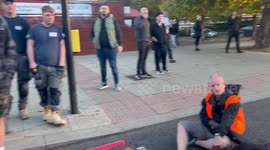 Angered motorists watch as Just Stop Oil activists block highway in London