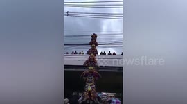 Brave performers form tall human tower for villager's birthday in Thailand
