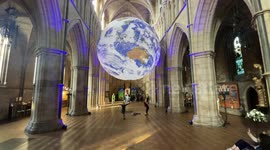 Gaia earth installation by artist Luke Jerram at Southwark Cathedral.