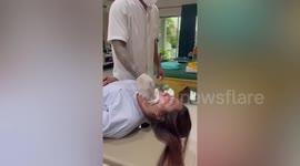 Thai traditional healer claims to cure Bell's Palsy by massaging client's face