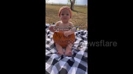 Halloween baby dons pumpkin pants for his adorable first spooky season