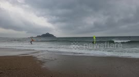 Marazion Beach Marazion Cornwall , High Winds and storms hit cornwall . windsurfers rush to the beach to take advantage of the high winds