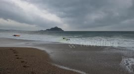 Marazion Beach Marazion Cornwall , High Winds and storms hit cornwall . windsurfers rush to the beach to take advantage of the high winds