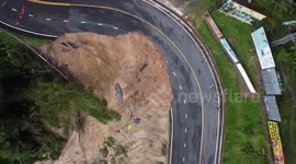 Road collapses as heavy rain causes landslide in Phuket, Thailand