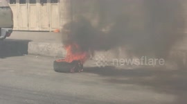 Palestinians clash with Israeli forces following a protest aginst the killing of Udai Tamimi