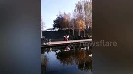 Woman falls into river after spinning repeatedly to dance in China