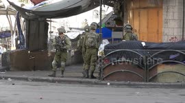 Palestinian protesters hurl stones towards Israeli forces during clashes