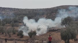 Palestinians clash with Israeli forces during a campaign to harvest olive, in Masafer Yatta