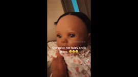 Grandma finds little girl doing hilarious silk press to her doll Thelma