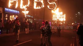 Crowds enjoy early Guy Fawkes bonfire night celebrations in Heathfield, UK