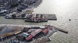 PS Waverley docks at Whitstable Harbour to drop off passengers before departing again