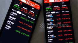 A-shares Closing Prices Display On A Phone In Yichang, China