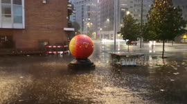 A lightning storm hits Stratford in East London. Patrons of the Stratford Picturehouse stayed inside the cinema to avoid the heavy downpour. Whilst people at the Westfield shopping center hid under cove