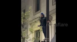 Baseball fan chugs drink after Philadelphia Phillies advance to World Series