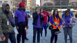 Man giving a speech at bike rally fordomestic violence awareness in New York, USA