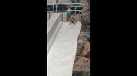 Dad senses DANGER while going down a water slide with 14-month-old daughter