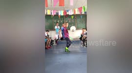 The next Messi? Chinese boy impresses classmates with kick-up skills