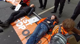 Protesters from Just Stop Oil block Horseferry Road, London.