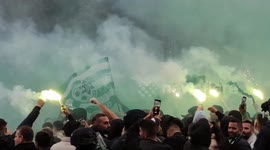 Israeli football fans light green flares for Champions League match in Paris