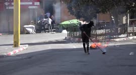 Palestinian protesters clash with Israeli forces in the West Bank city of Hebron following the killing of six Palestinian during overnight Israeli raid in Nablus