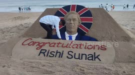 Indian sand artist creates Rishi Sunak sculpture congratulating him on becoming UK PM