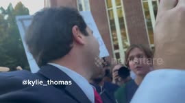 Moment US student spits on Alex Stein during protest over far-right event