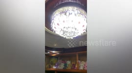 Philippines earthquake jolts home shaking lights and Christmas tree