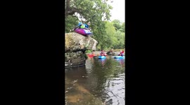 Kayaker dives into river and springs right back out to do a JAW-DROPPING aerial flip