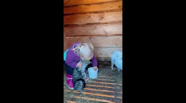 1year old girl falls in love with her cat
