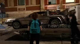 Time Travel Machine Broken Down In London? The Back To The Future DeLorean on the back of a recovery vehicle