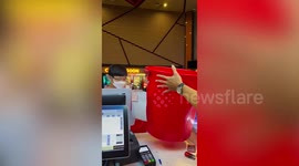 Man hilariously brings massive bucket during cinema's free popcorn giveaway