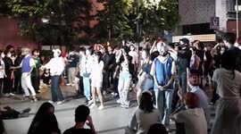 Thai teens dance to K-Pop music at park in Bangkok