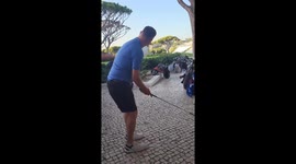 Golfer given hero's welcome after hitting his ball into restaurant and then striking best shot of day