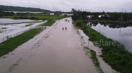 Drone footage shows widespread flooding caused by Typhoon Nalgae in the Philippines