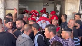 Palestinians attend the funeral of Imad Abu Rashid and Ramzi Zubara, who was killed by Israeli forces