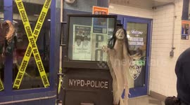 NYPD get in the Halloween spirit at a police post in a New York City subway station
