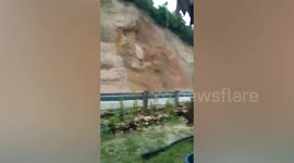 Typhoon Nalgae causes mountain landslide next to homes in the Philippines