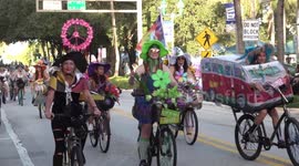 300 witches cycle through Florida's Delray Beach in annual Halloween charity event, before cop knocked off motorbike