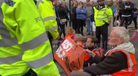 Police arrest Just Stop Oil activists blocking roads outside Spitalfields Market in London