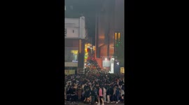Huge crowd of people seen jammed into narrow Seoul street before deadly stampede