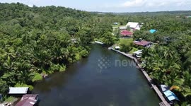 Drone footage shows Yokiwa Village near Sentani Lake in Papua, Indonesia