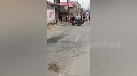 Motorist unable to stop out-of-control tractor from spinning around in China