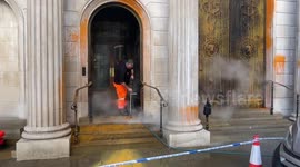 Just Stop Oil: Workers clean orange paint off Bank of England's exterior