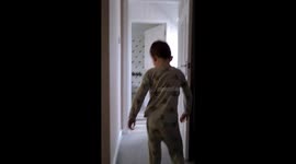 Kid walking in woman's heels