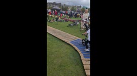 My son learning to do his balance bike on a cycle track and ramps in Dundee